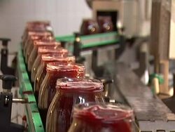 Glass jar with beetroot on conveyor line Stock Footage