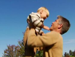 Father and Son Play in Nature Stock Footage