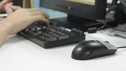 Typing on a Notebook Stock Footage