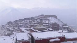 Snow clings to a Tibetan village. Stock Footage