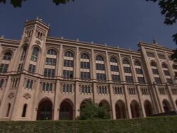 Museum fÃƒÂ¼r VÃƒÂ¶lkerkunde, architecture, museum, building,  trees, bushes, blue sky Stock Footage