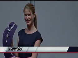 Liz Taylor jewels auction nets millions, including record price paid for pearl. News Clip