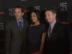 Bill Phillips, Rosario Dawson and Ronan Gardiner at Men's Health Celebrates 25th Anniversary Stock Footage