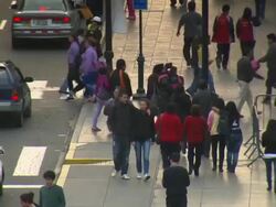 "Busy pedestrian crossing at corner of Plaza Mayor/Plaza de la Armas of Lima, Lima, Peru" Stock Footage