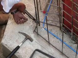 CU Shot of workmen at formwork construction at new sewage pipe / Brotdorf, Rhineland Palatinate, Germany Stock Footage