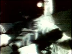 U.S. Astronaut David Scott performs a gravity experiment on the Moon. News Clip