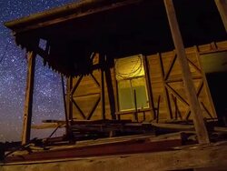 MS TS T/L View of cottage at night / Queensland, Australia Stock Footage