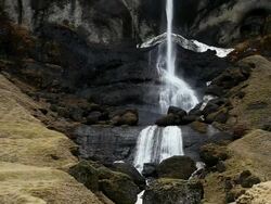 WS View of Water fall flowing in to bottom / Iceland  Stock Footage
