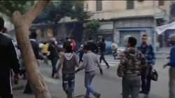 Protesters attack police vehicles in Tahrir Square; injuries News Clip
