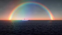 A rainbow is reflected on the horizon as a cruise ships sails along calm water. Stock Footage