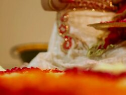 Young woman preparing rangoli in diwali festival Stock Footage