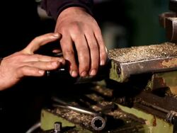 Operating the Industrial Lathe (close up) Stock Footage