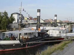 MS Shot of Museum ship at Old steam boat at Danube river / Regensburg, Bavaria, Germany Stock Footage