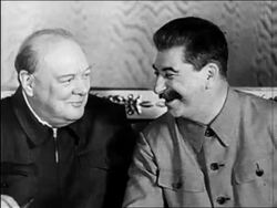 B/W 1942 Winston Churchill + Josef Stalin smiling + talking indoors / Kremlin / newsreel Stock Footage