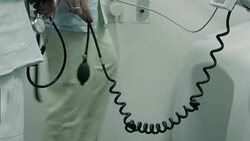 Doctor testing his patient on a tradmill Stock Footage