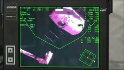SpaceX Capsule Delivers Docking Port to ISS Instructional Video