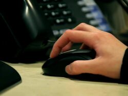 Woman Using a Computer Mouse Stock Footage