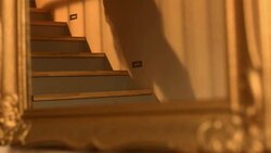 HD: Woman In Nightie Walking Down The Stairs Stock Footage
