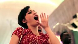 Friends rock out and shout along with band at outdoor concert in downtown Las Vegas Stock Footage