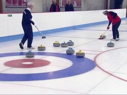 Middle Aged Women Curling News Clip