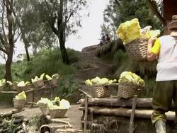 MS Miner arriving at the payment cabin / Ijen, Java, Indonesia Stock Footage
