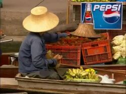 MS of woman selecting fruit at Floating Market, Bangkok, Thailand Stock Footage