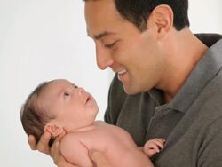 CU Father Holding Newborn Baby / Richmond, Virginia, USA Stock Footage