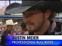 Professional bull riders take to New York's Times Square, dirt, fences, bulls and all. The top 10 bull riders in the standings competed in an outdoor arena on the streets of the Manhattan landmark. News Clip