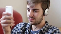 Listening to music on headphones. At home. Stock Footage