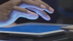 Woman hand using digital tablet at coffee cafe Stock Footage
