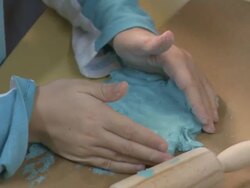 CHILD PLAYING WITH plasticine Stock Footage