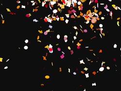 MS SLO MO Shot of Multi colored Confetti Falling against Black background / Vieux Pont en Auge, Normandy, France Stock Footage