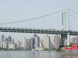 -WS View of ship moving from under Manhattan Bridge / New York, United States Stock Footage