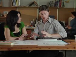 MS PAN Young architects working on and discussing building plans / Portland, Oregon, USA Stock Footage
