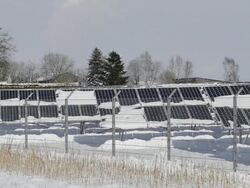 MS Shot of snow lying on solar panels, photovoltaic / Landshut, Bavaria, Germany Stock Footage