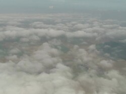 Titling Down Through Broken Cloud To Ressaincourt Stock Footage