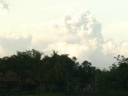 Major eruption at Merapi volcano sends ash high into atmosphere; Indonesia. 7 November 2010 / AUDIO Stock Footage