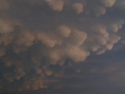WS View of orange mammatus clouds with lightning / Henrietta, Texas, United States Stock Footage