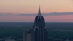 Detail view of RSA Battle House Tower skyscraper at dusk in Mobile, Alabama. Stock Footage