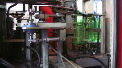 Plastic bottle production unit Stock Footage