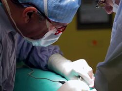 doctor performing surgery Stock Footage