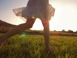 HD Super Slow-Mo: Running Barefoot In The Grass Stock Footage