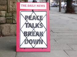 Newspaper Headline Board - Peace talks break down Stock Footage