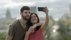 Young couple take selfie above Austin, Texas skyline Stock Footage