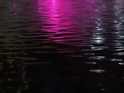 City night lights reflection in a river Stock Footage