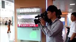 CLEAN : Seoul residents watch latest N.Korea missile launch news News Clip