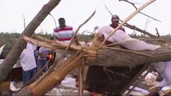 Residents of Mayflower, Arkansas salvage what they can from their homes Monday after a powerful tornado hit the day before killing at least 14 people and carving an 80-mile path of destruction through suburban Little Rock. (April 28) News Clip