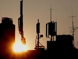 HD Sunset Behind Base Station Antennas Time Lapse Stock Footage