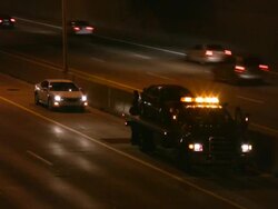 Tow Truck on highway. Road assistance. Emergency stop. Stock Footage