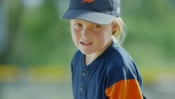 Close up slow motion shot of baseball pitcher reading signs / American Fork, Utah, United States Stock Footage